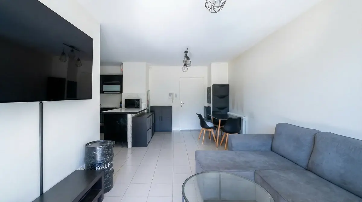 Photo 2 - Exclusivité Appartement 3 pièces jardin avec terrasse et place de parking privative 