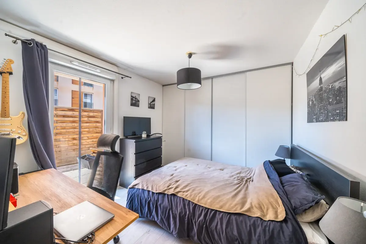 Photo 5 - Appartement 3 pièces avec terrasse, box fermé et place de parking privative 